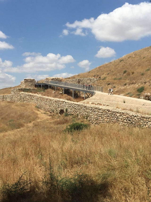 The ancient gate at Lachish with a newly-constructed visitor's ramp matches the level during the time of the Babylonian conquest, though it is criticized by some archaeologists for distracting attention from the actual ruins. (Photo by Luke Chandler)