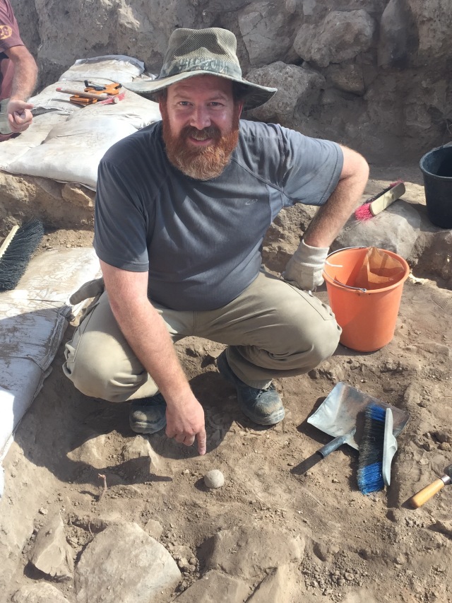 The moment after discovering a sling stone in the 2015 season at Lachish.